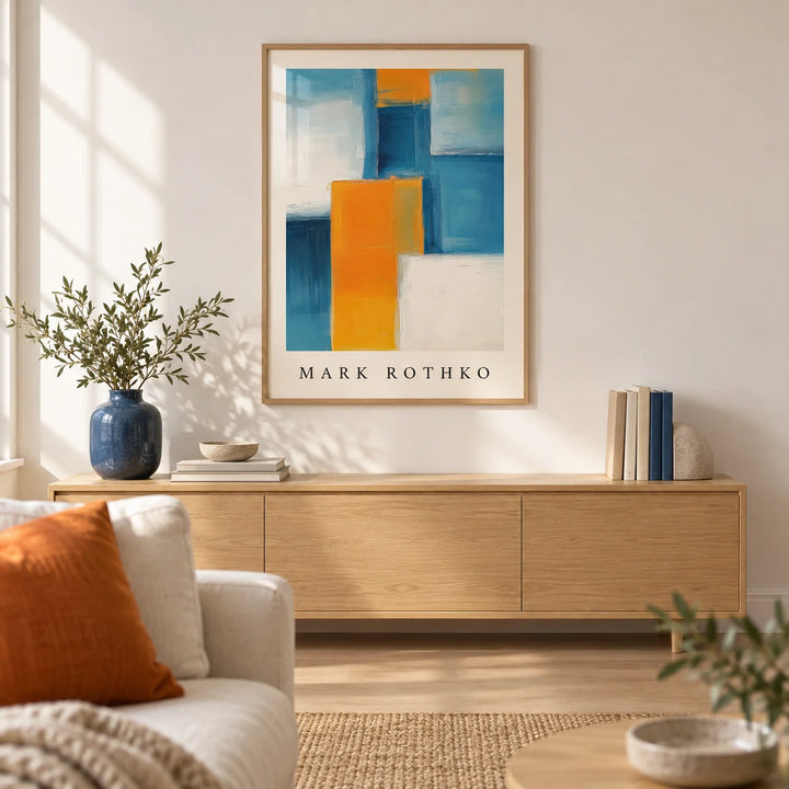 Blue and Yellow Wall Art, framed on the wall of a calm modern living room with a warm white wall and a pale oak floor