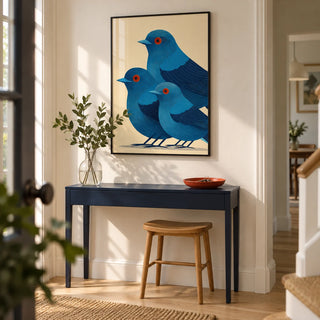 Blue Bird Art Print, framed on the wall of a welcoming hallway in a modern UK first home with cream walls and a pale oak floor