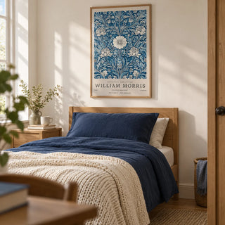 Blue Botanical Prints, framed on the wall of a calm single guest bedroom with a warm white wall