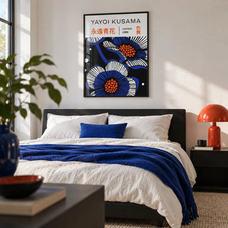 Blue Flower Poster, framed on the wall of a calm modern bedroom with a white wall