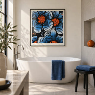 Blue Flower Wall Art, framed on the wall of a contemporary bathroom in a renovated UK townhouse with ivory painted walls and large plain pale grey tiles