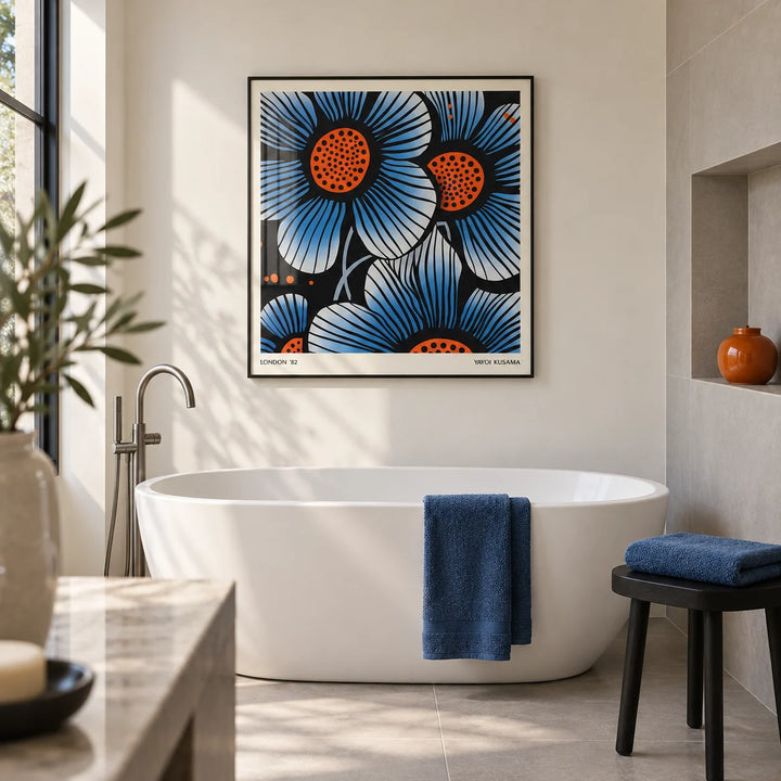 Blue Flower Wall Art, framed on the wall of a contemporary bathroom in a renovated UK townhouse with ivory painted walls and large plain pale grey tiles