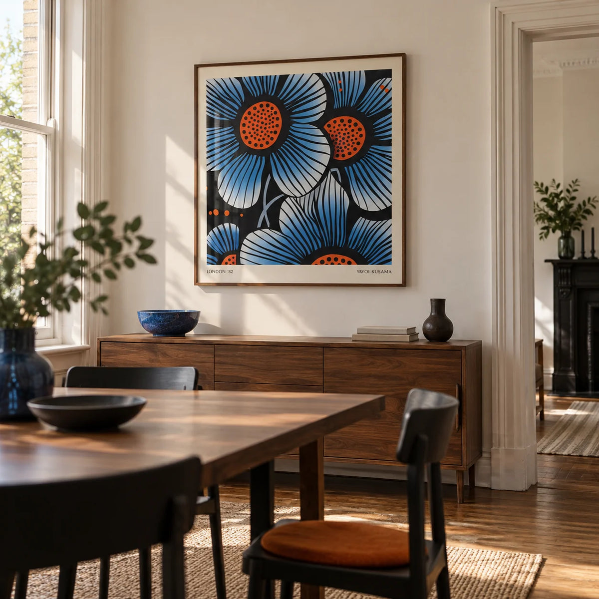 Blue Flower Wall Art, framed on the wall of a design-led dining room in a Victorian terrace with warm white walls and a wide doorway