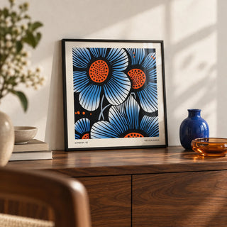 Blue Flower Wall Art, a small A4 framed print leaning on a walnut side table in a hallway