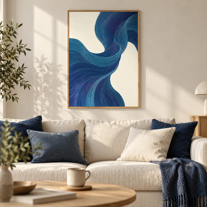 Blue Flowing Wall Art, framed on the wall of a calm Scandinavian living room