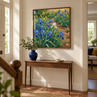 Blue Iris Art Print, framed on the wall of a welcoming hallway in a British semi-detached home with chalky ivory walls and a plain terracotta floor