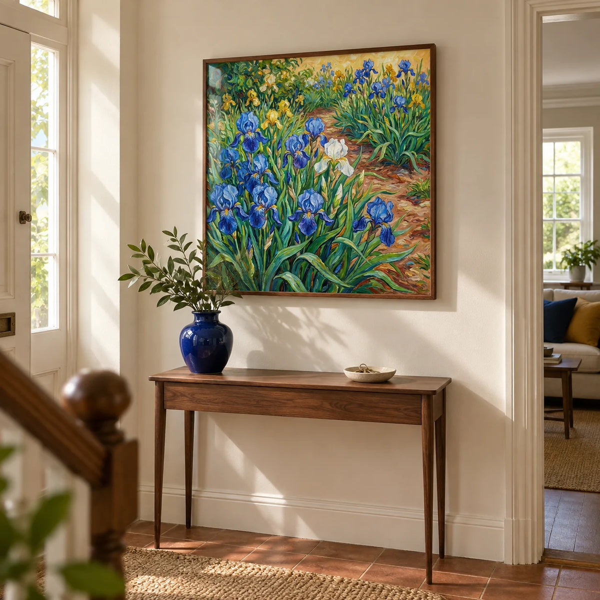 Blue Iris Art Print, framed on the wall of a welcoming hallway in a British semi-detached home with chalky ivory walls and a plain terracotta floor