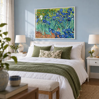 Blue Iris Wall Art, framed on the wall of a calm bedroom with a pale blue painted wall