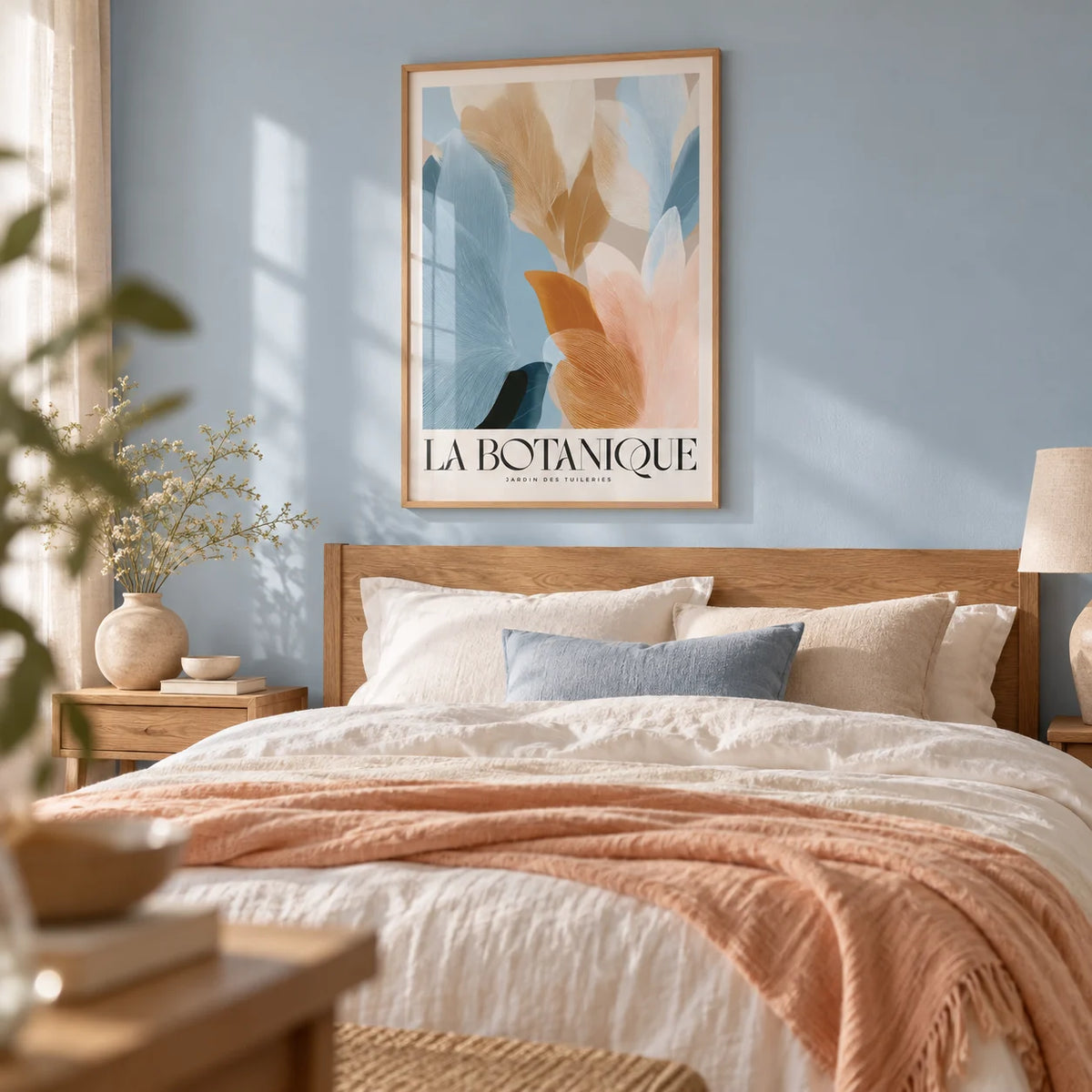 Blue Pink Wall Art, framed on the wall of a calm bedroom with a soft powder blue wall