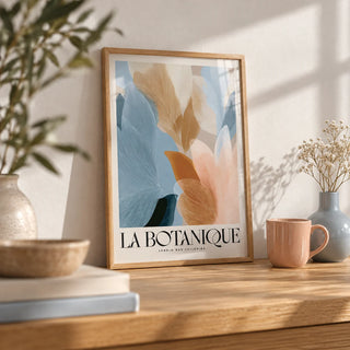 Blue Pink Wall Art, a small A4 framed print leaning on an oak shelf in a living room