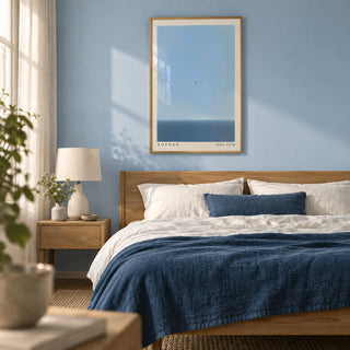 Blue Wall Art, framed on the wall of a calm bedroom with a soft sky blue painted wall