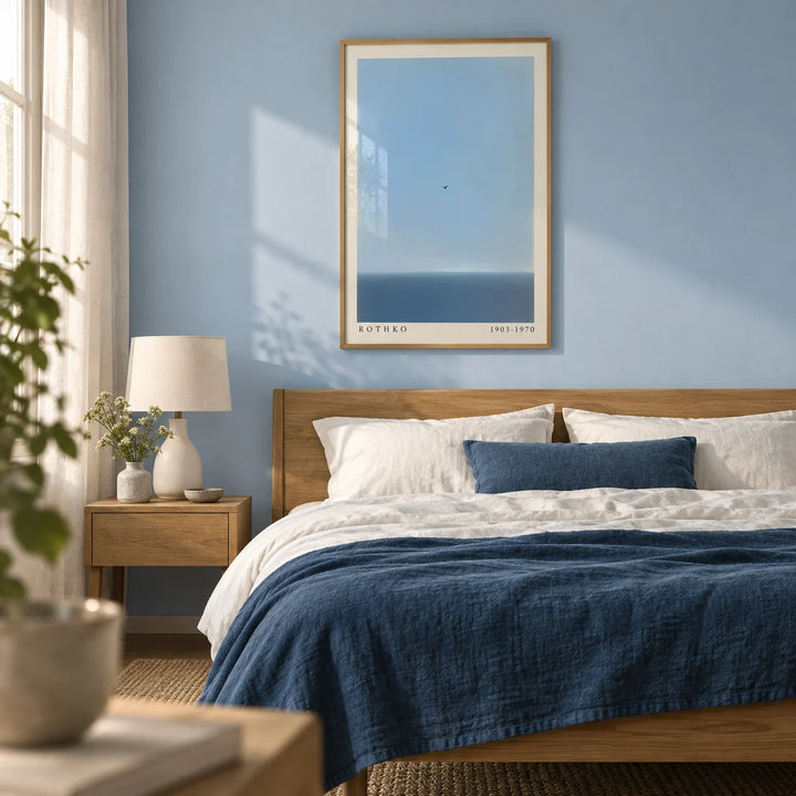 Blue Wall Art, framed on the wall of a calm bedroom with a soft sky blue painted wall