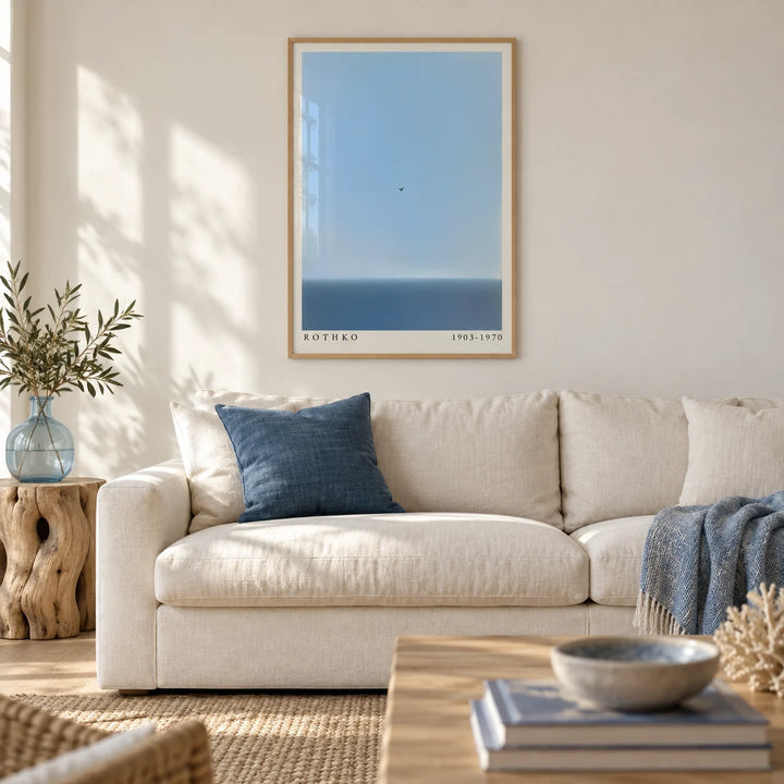 Blue Wall Art, framed on the wall of a calm coastal living room with a warm white wall and a pale oak floor