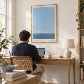 Blue Wall Art, framed on the wall of a calm home office with a white wall