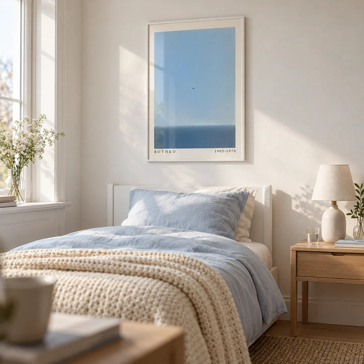 Blue Wall Art, framed on the wall of a calm single guest bedroom with a white wall