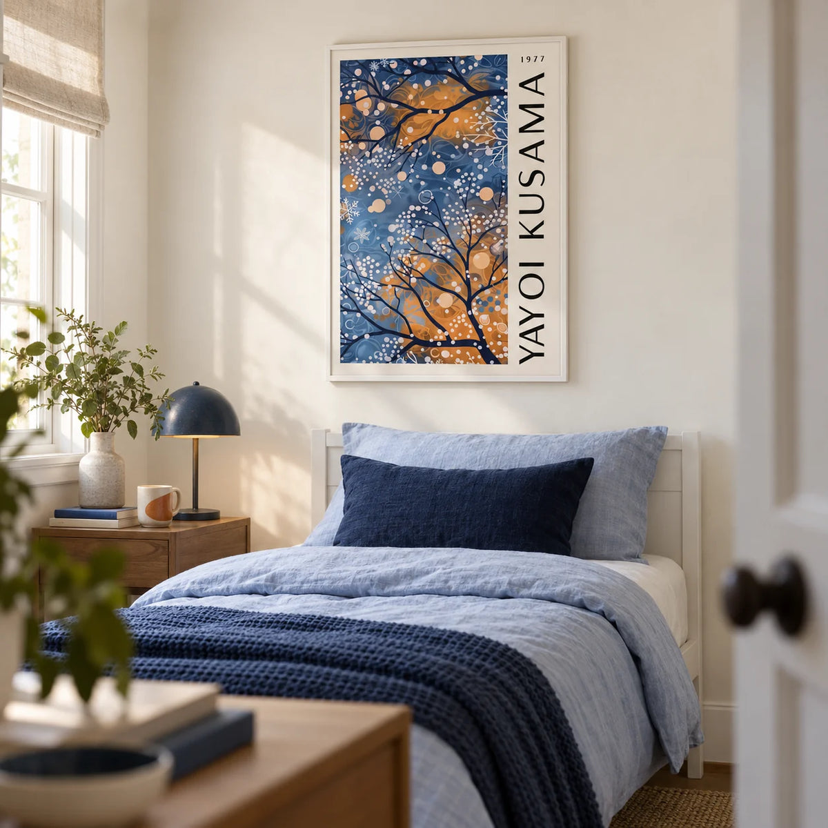 Blue Wall Art for Living Room, framed on the wall of a calm single guest bedroom with a soft cream wall
