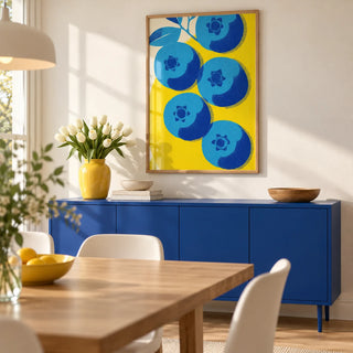 Blueberry Wall Art, framed on the wall of a cheerful dining room with a soft white wall and an oak floor