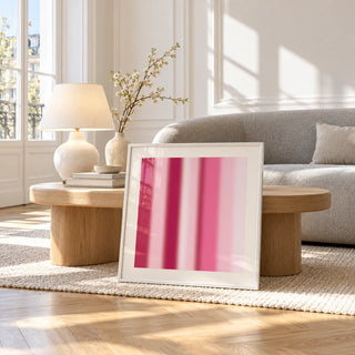 Blurred Print, framed and leaning against a coffee table in a bright living room