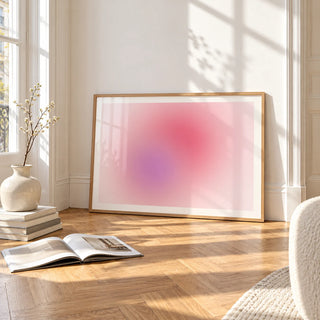 Blush Wall Art, framed and leaning on the parquet floor of a bright living room