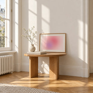 Blush Wall Art, a small A4 framed print leaning on a small solid oak side table