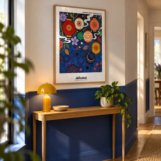 Bohemian Lantern Poster, framed on the wall of a hallway with a cobalt blue painted lower wall and a white upper wall