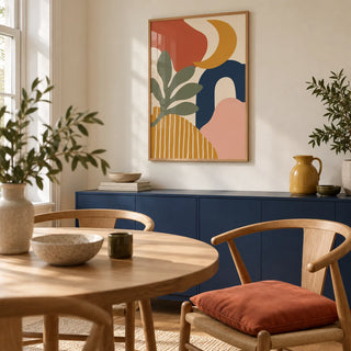 Boho Wall Art, framed on the wall of a compact dining room in a design-conscious UK flat with a cream wall and a navy painted low cupboard