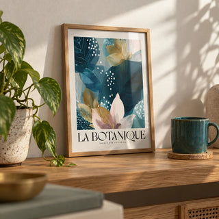 Botanical Artwork Print, a small A4 framed print leaning on an oak shelf in a living room