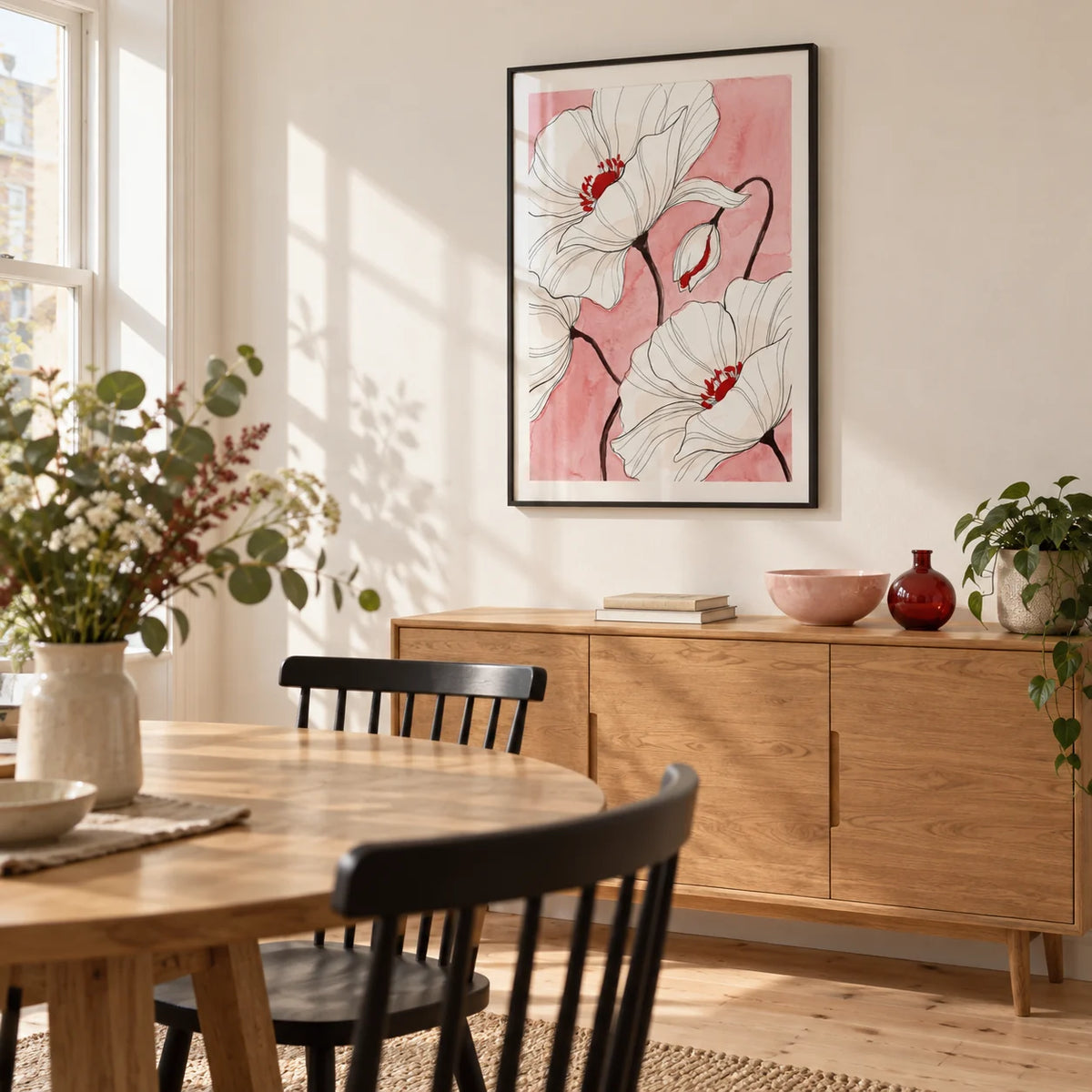 Botanical Floral Art Print, framed on the wall of a bright dining room in a renovated UK terrace with warm white walls and pale timber floorboards