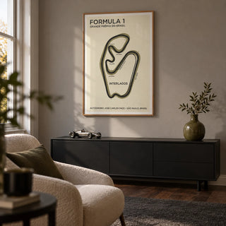 Brazilian Race Circuit Poster, framed on the wall of a small racing fan's snug in a UK terraced house with a warm grey wall and dark wood floor in a living room
