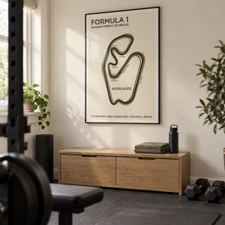Brazilian Race Circuit Poster, framed on the wall of a tidy home gym in a converted UK spare room with a cream wall and plain charcoal rubber floor
