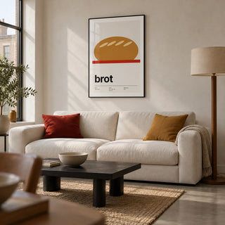 Bread Poster, framed on the wall of a modern living room in a UK city flat with pale plaster walls and a polished concrete floor