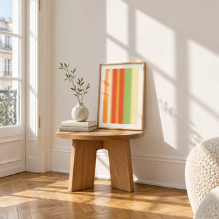 Bright Abstract Wall Art, a small A4 framed print leaning on a small solid oak side table