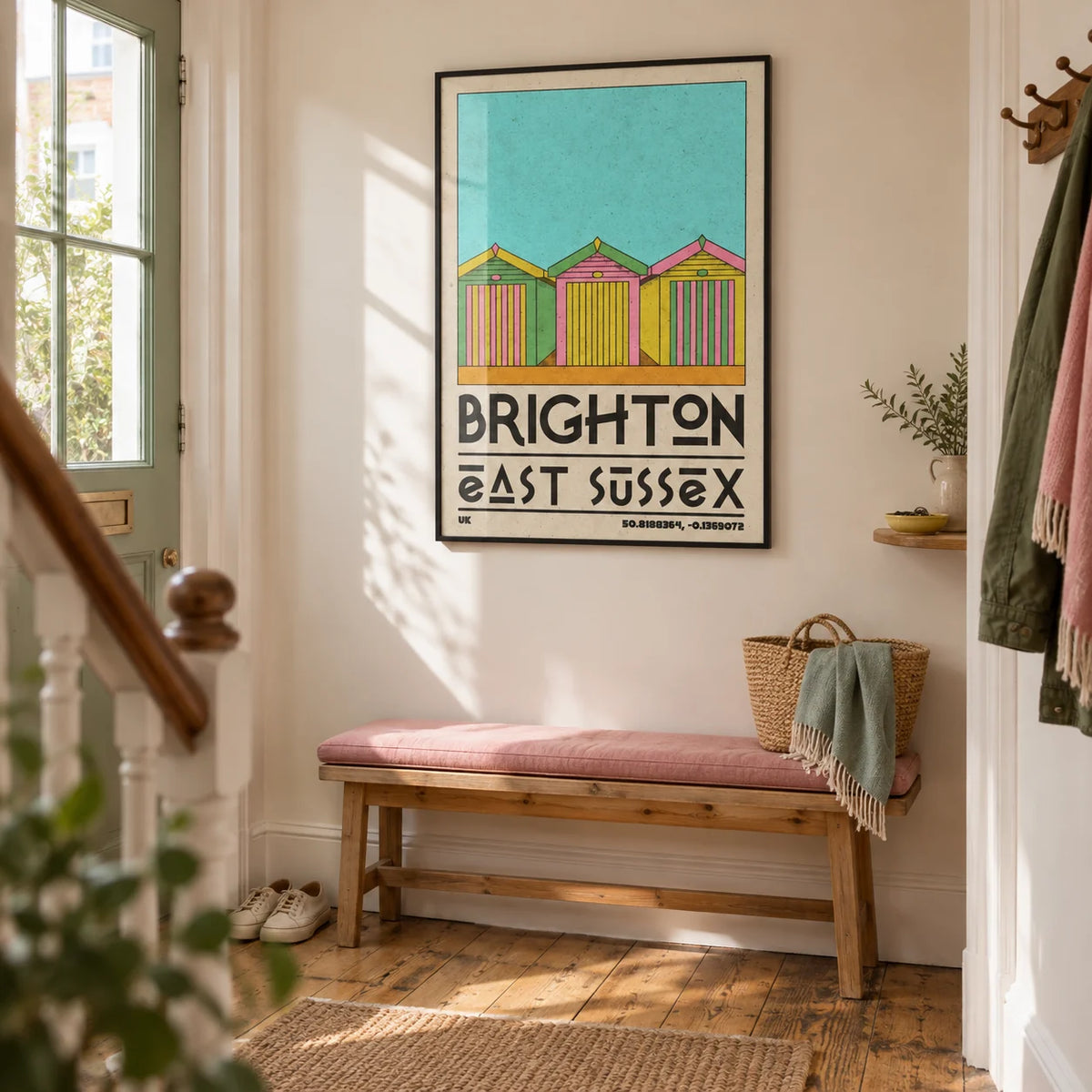 Brighton Travel Print, framed on the wall of a welcoming hallway in a British seaside terrace with cream walls