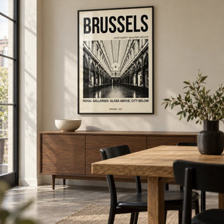 Brussels Gallery Print, framed on the wall of a modern dining room in a renovated UK terrace with a pale beige wall and a polished concrete floor