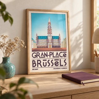 Brussels Grand Place Art Print, a small A4 framed print leaning on a pale oak desk