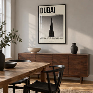 Burj Khalifa Art Print, framed on the wall of a modern dining room in a UK townhouse with a pale grey wall and oak floor