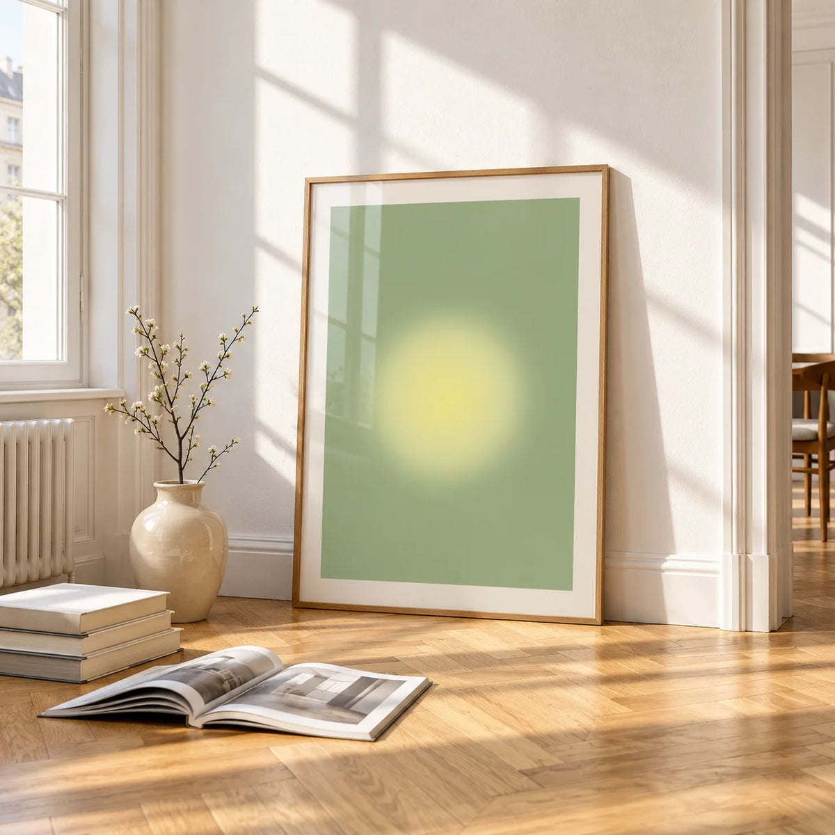 Butter Yellow Wall Art, framed and leaning on the parquet floor of a bright living room