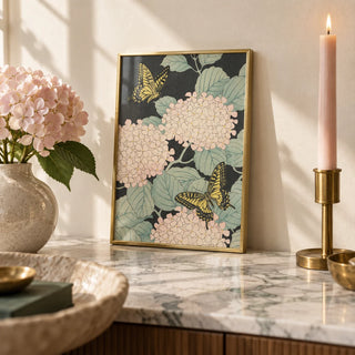 Butterfly Art Print, a small A4 framed print leaning on a marble side table in a hallway