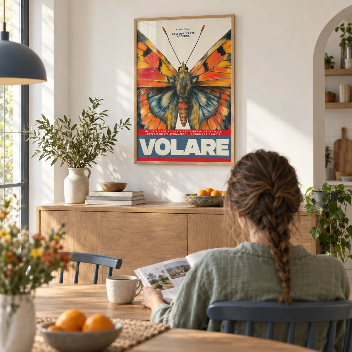 Butterfly Art Wall, framed on the wall of a bright kitchen-diner with a white wall