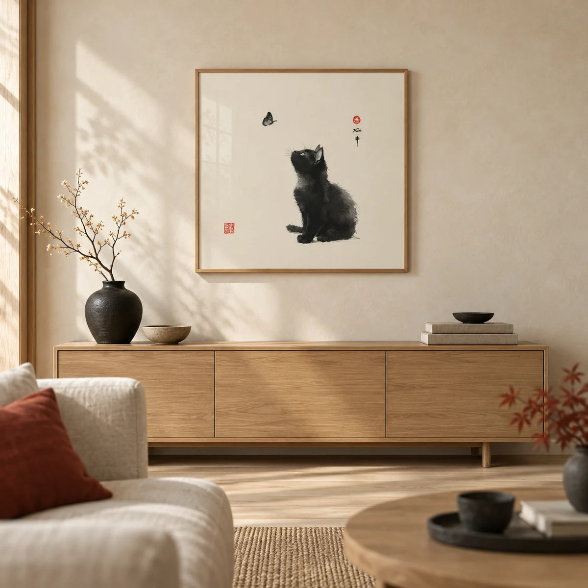 Butterfly Cat Poster, framed on the wall of a calm Japandi living room with a warm cream limewashed wall and a pale oak floor