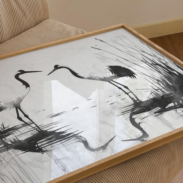 Minimalist bird print with cranes in water and soft ink shadows.