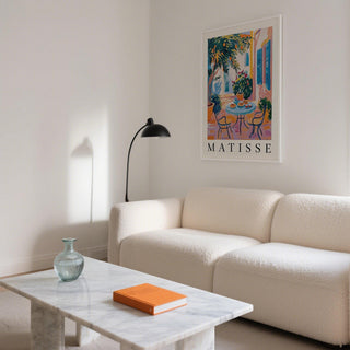 Colorful outdoor dining scene depicted in this wall art Mediterranean piece.