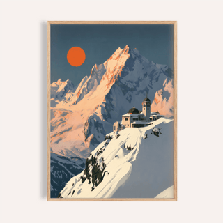 Framed Art Deco Mountain Poster with snowy alpine peak and orange sun on cream wall