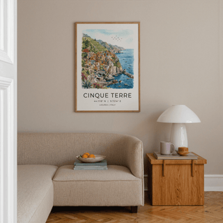 Watercolor seaside artwork of Riomaggiore skyline against blue horizon