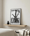 Side-by-side giraffes print with central tree and savanna background in black and white
