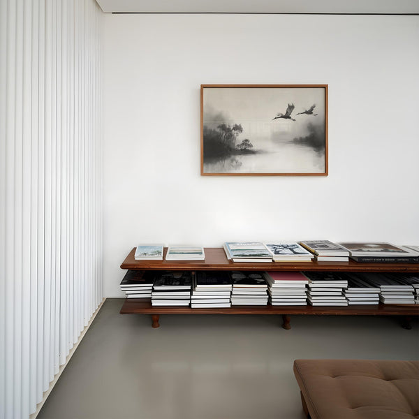 Flying birds over foggy lake with trees, elegant Japanese cranes flying art.