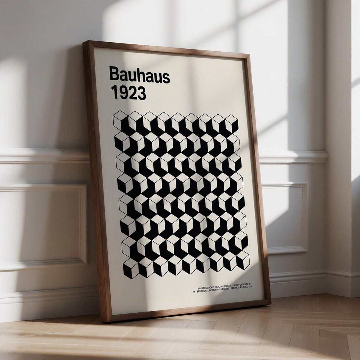 Bauhaus Design Poster featuring black and white 3D cube pattern on cream background.