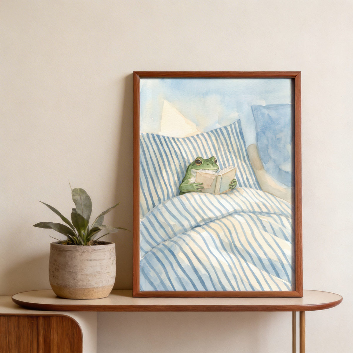 Whimsical Frog Reading in Bed Print poster with striped bedding