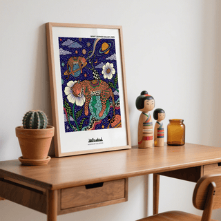 Detailed Leopard Galaxy Art Print depicting leopards lounging on planets with swirling ribbons