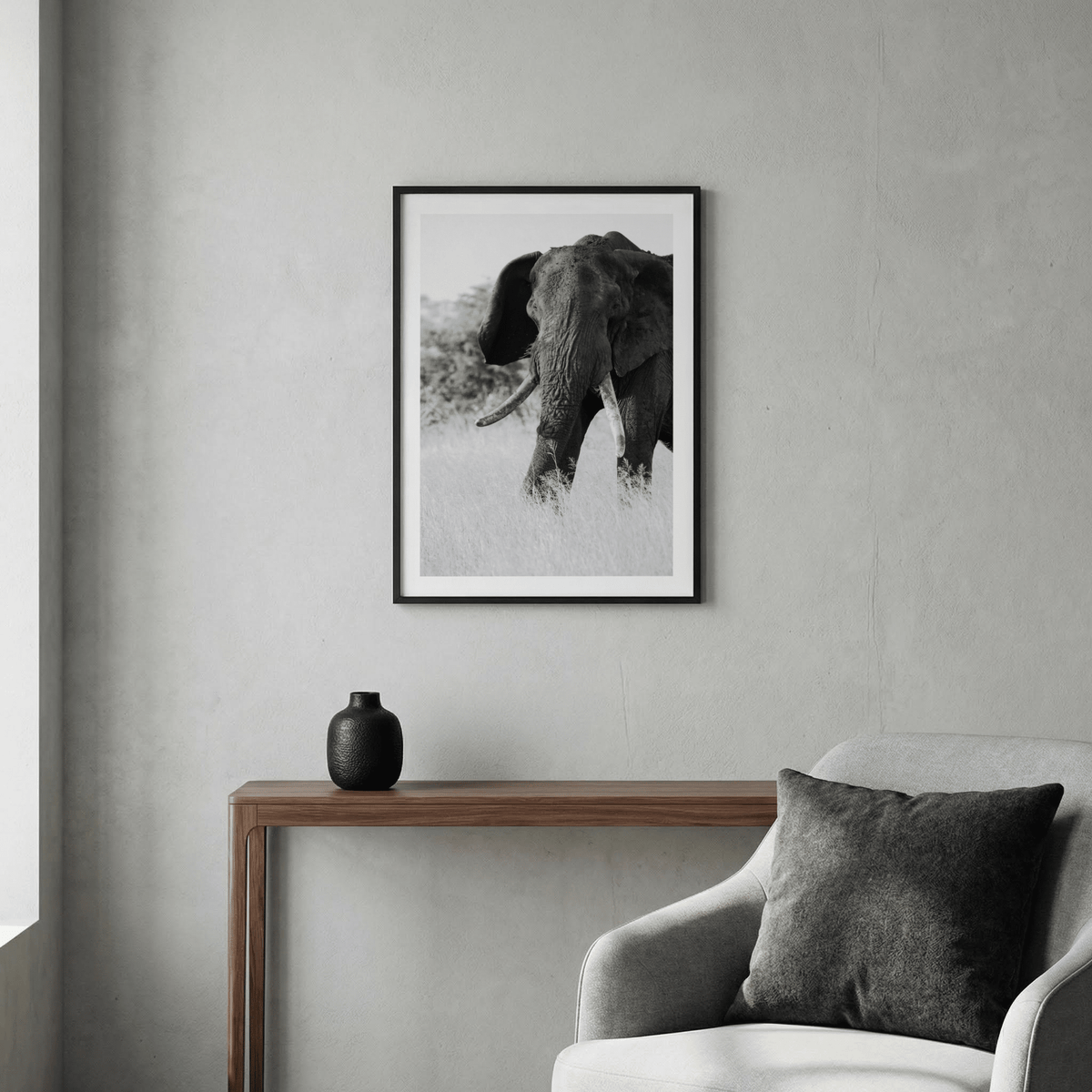 Elephant Black and White Art Print displayed as vertical wall poster with subtle border